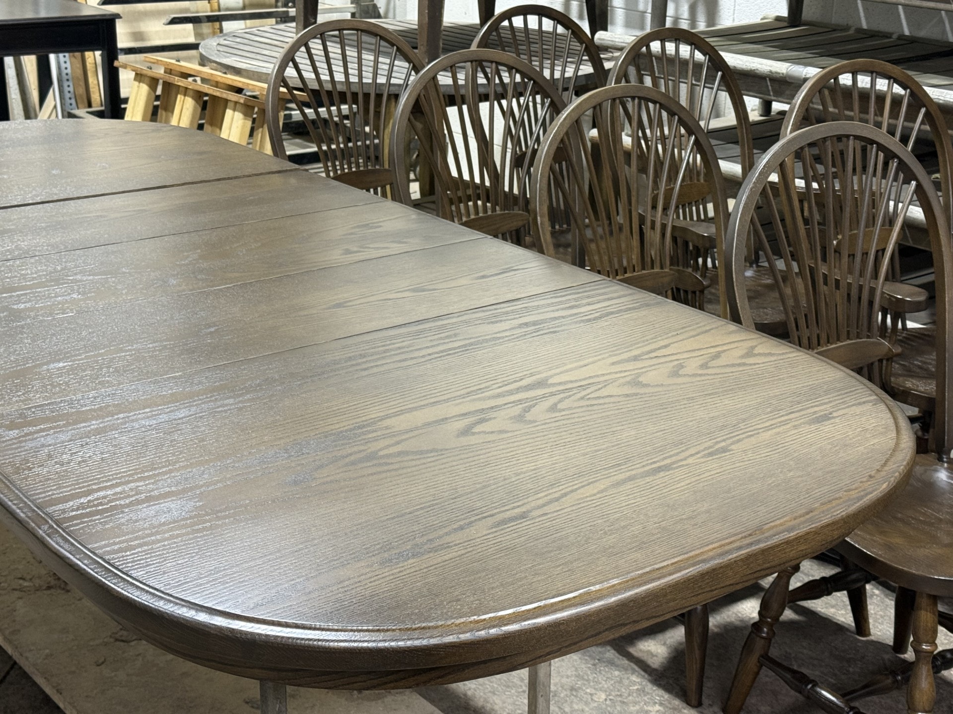 Wooden dining table with spindle chairs