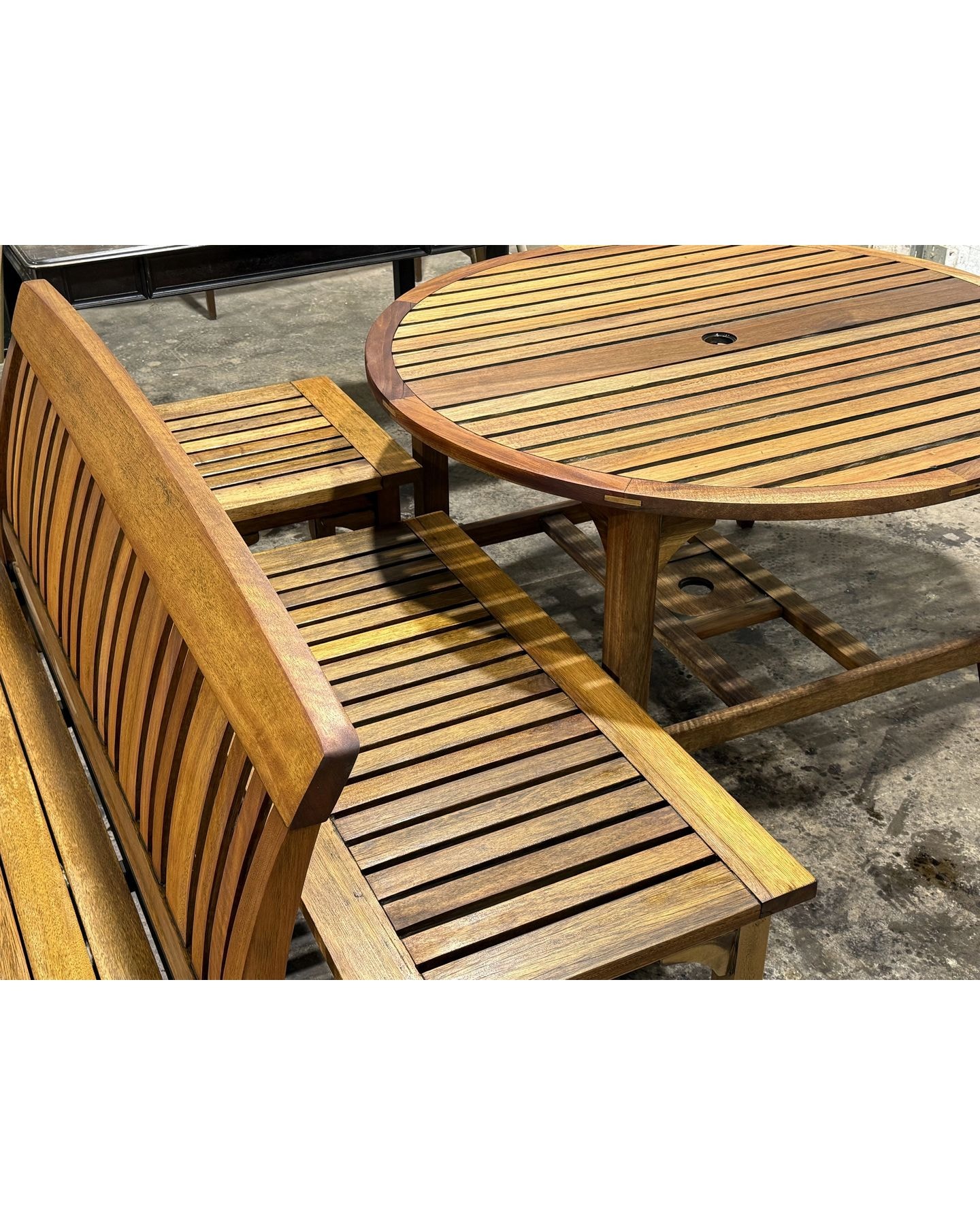 Wooden outdoor furniture set display